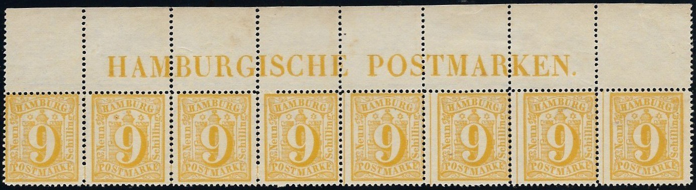Ein dekorativer Oberrandstreifen. Sie sehen, wie unterschiedlich gut (oder schlecht) die Zentrierung der Marken ist.